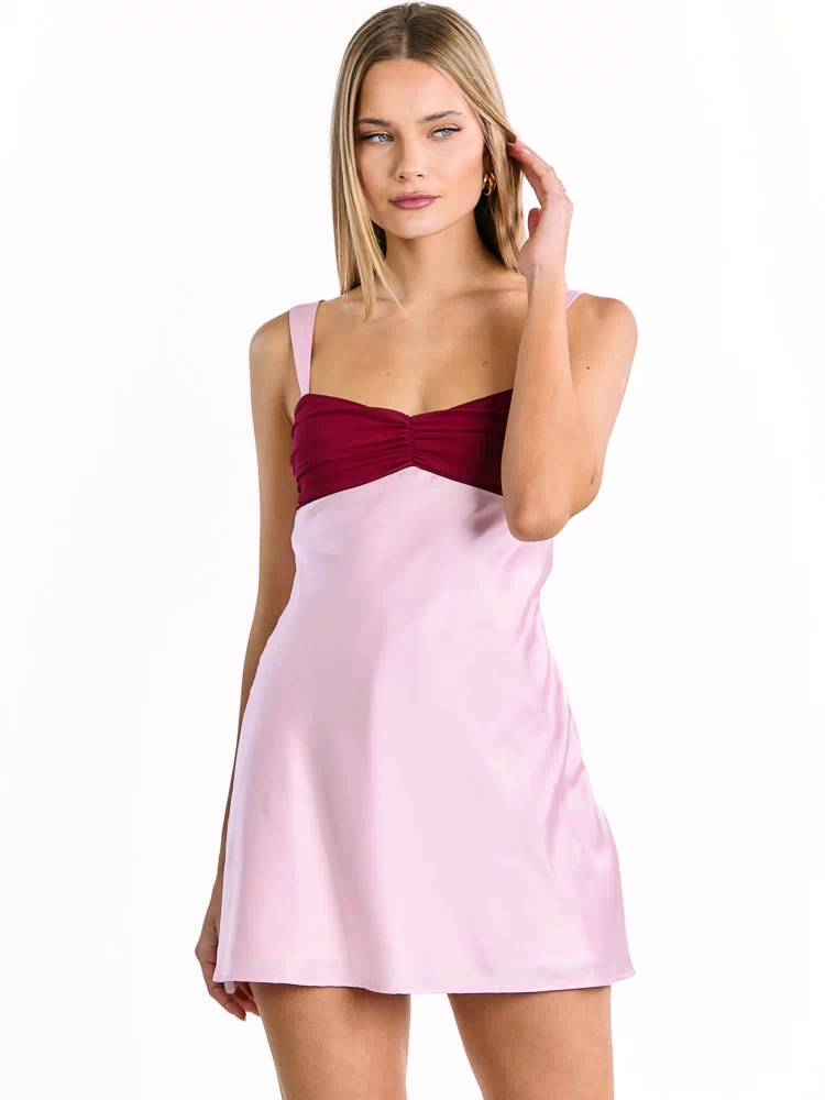 Contrast pink satin mini dress with a ruched dark pink bust and wide shoulder straps