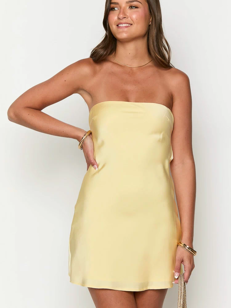 Front view of a yellow satin strapless mini dress with a straight neckline and relaxed fit