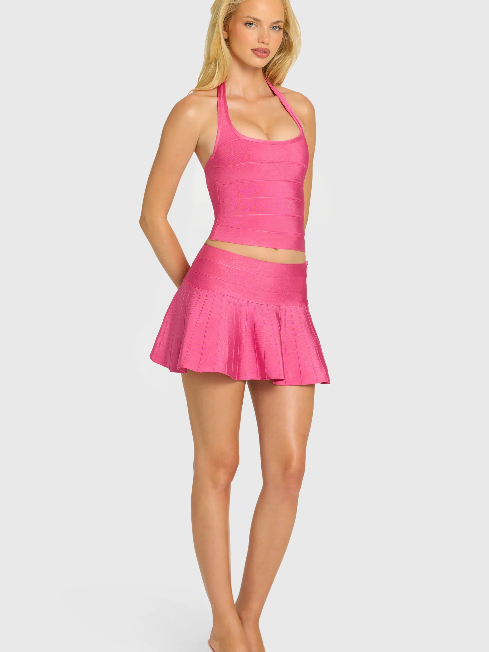 Bandage Low-Rise Mini Skirt in Raspberry