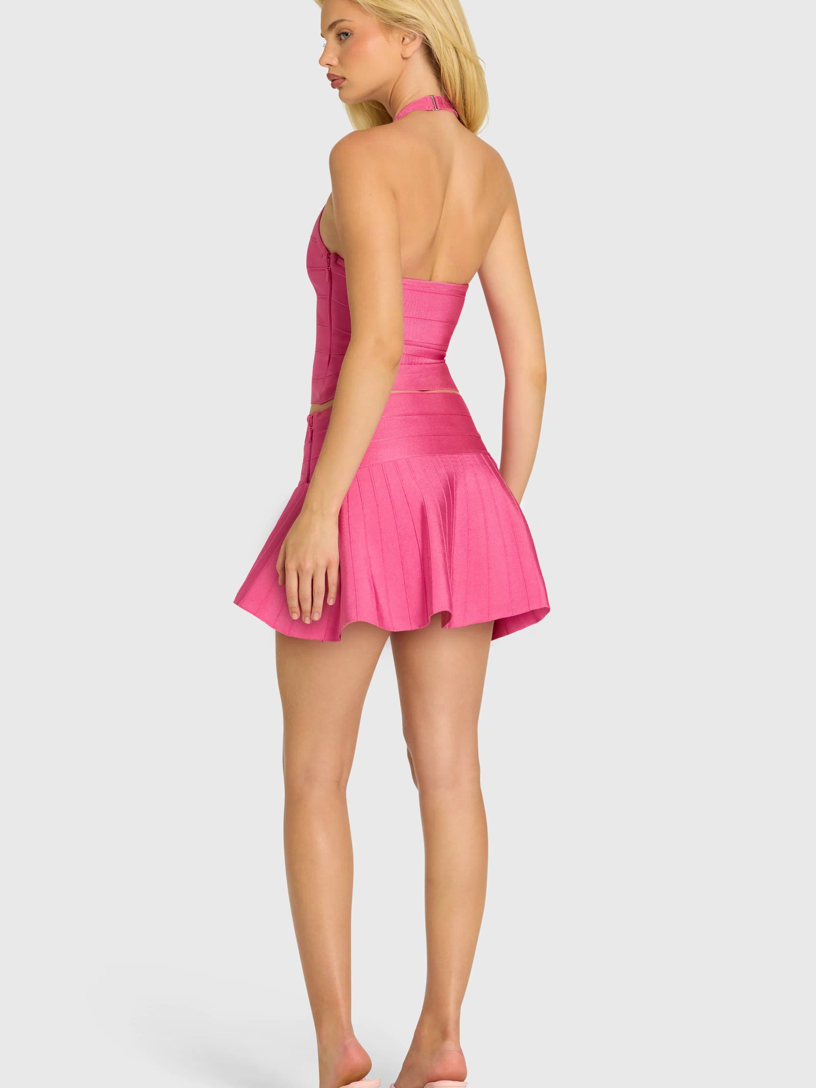 oh-polly-naomi-bandage-low-rise-mini-skirt-in-raspberry-pink_16448NaomiRaspberryPink_2.jpg