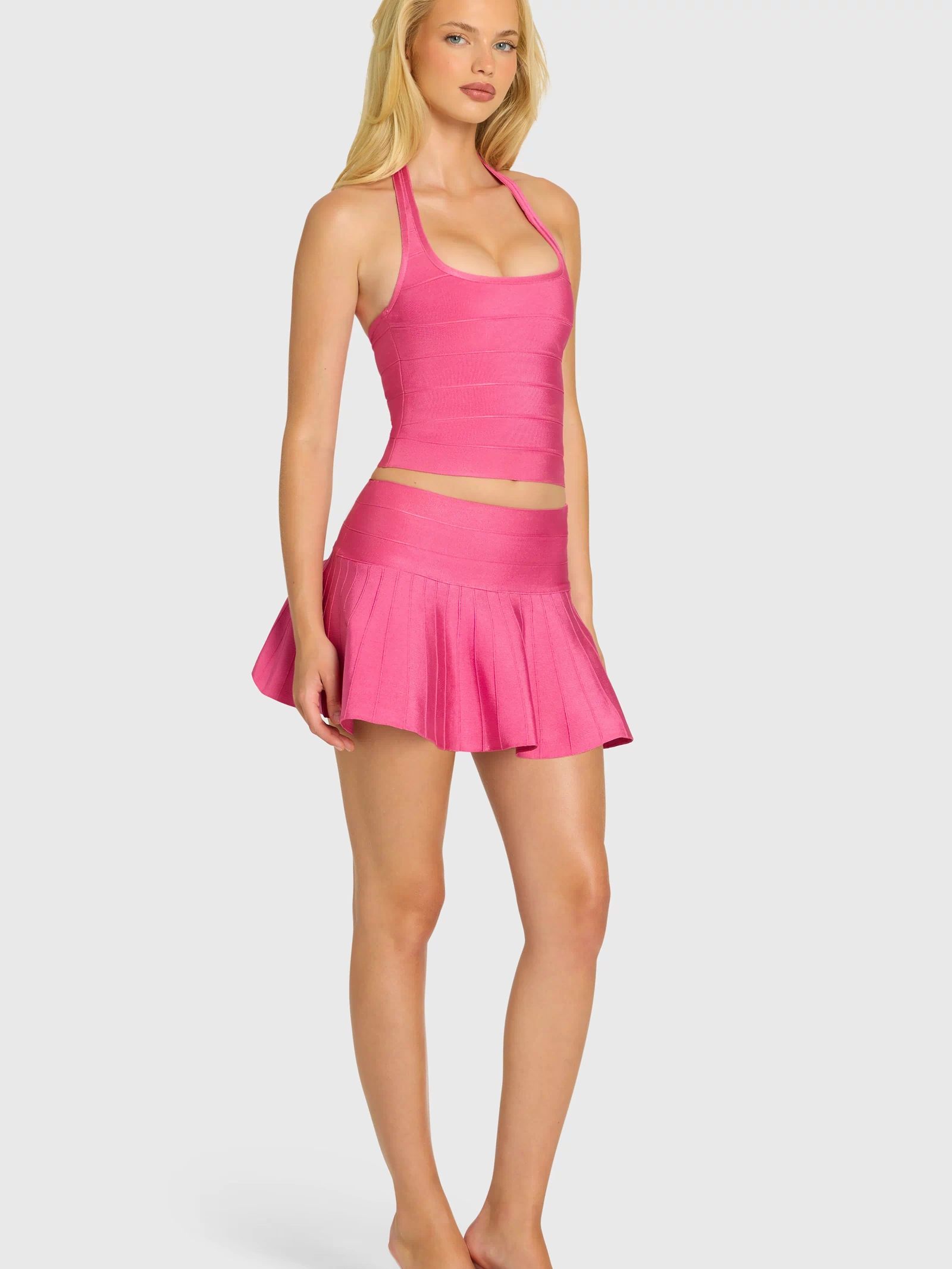 oh-polly-naomi-bandage-low-rise-mini-skirt-in-raspberry-pink_16448NaomiRaspberryPink_6.jpg