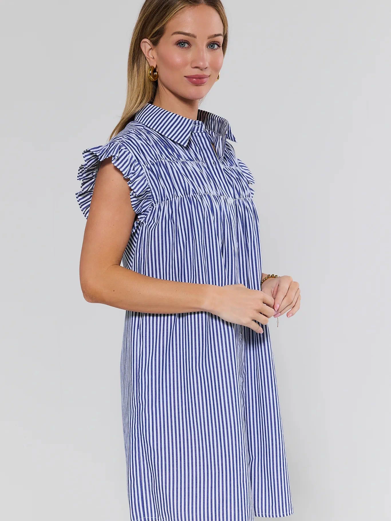 Neacie Navy Striped Short Dress with ruffle cap sleeves - Side View | Avara