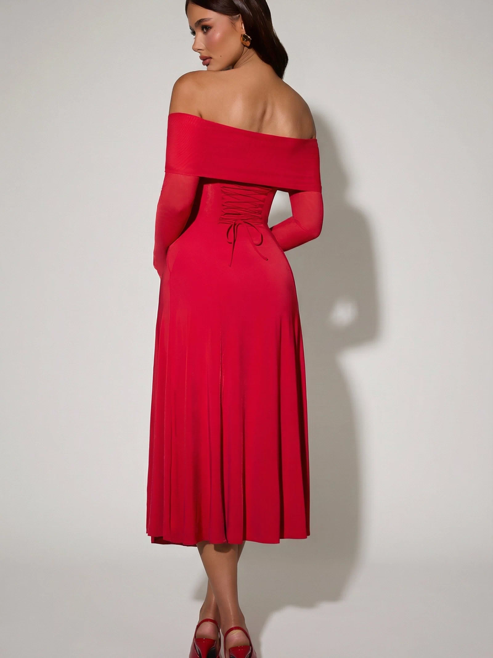 Oh Polly's Ella wearing the Nerissa Midaxi Dress in Red Sheer Jersey fabric perfect for cocktail parties