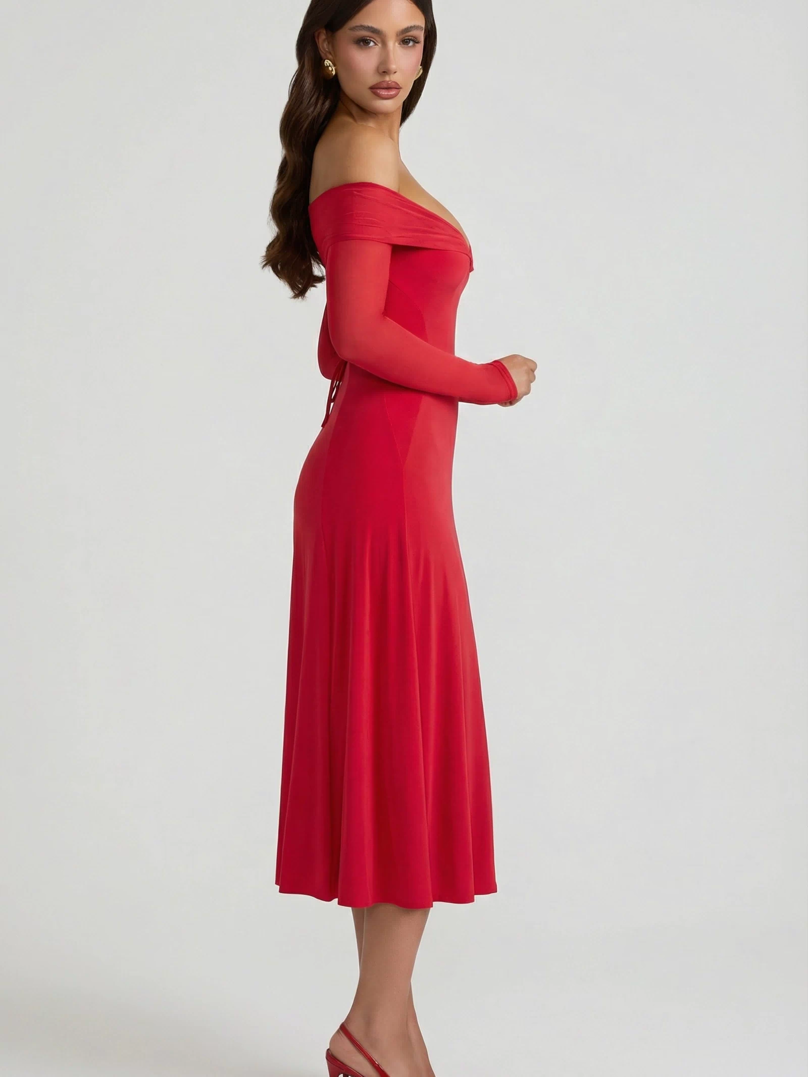 Oh Polly's Ella wearing the Nerissa Midaxi Dress in Red Sheer Jersey fabric perfect for evening events