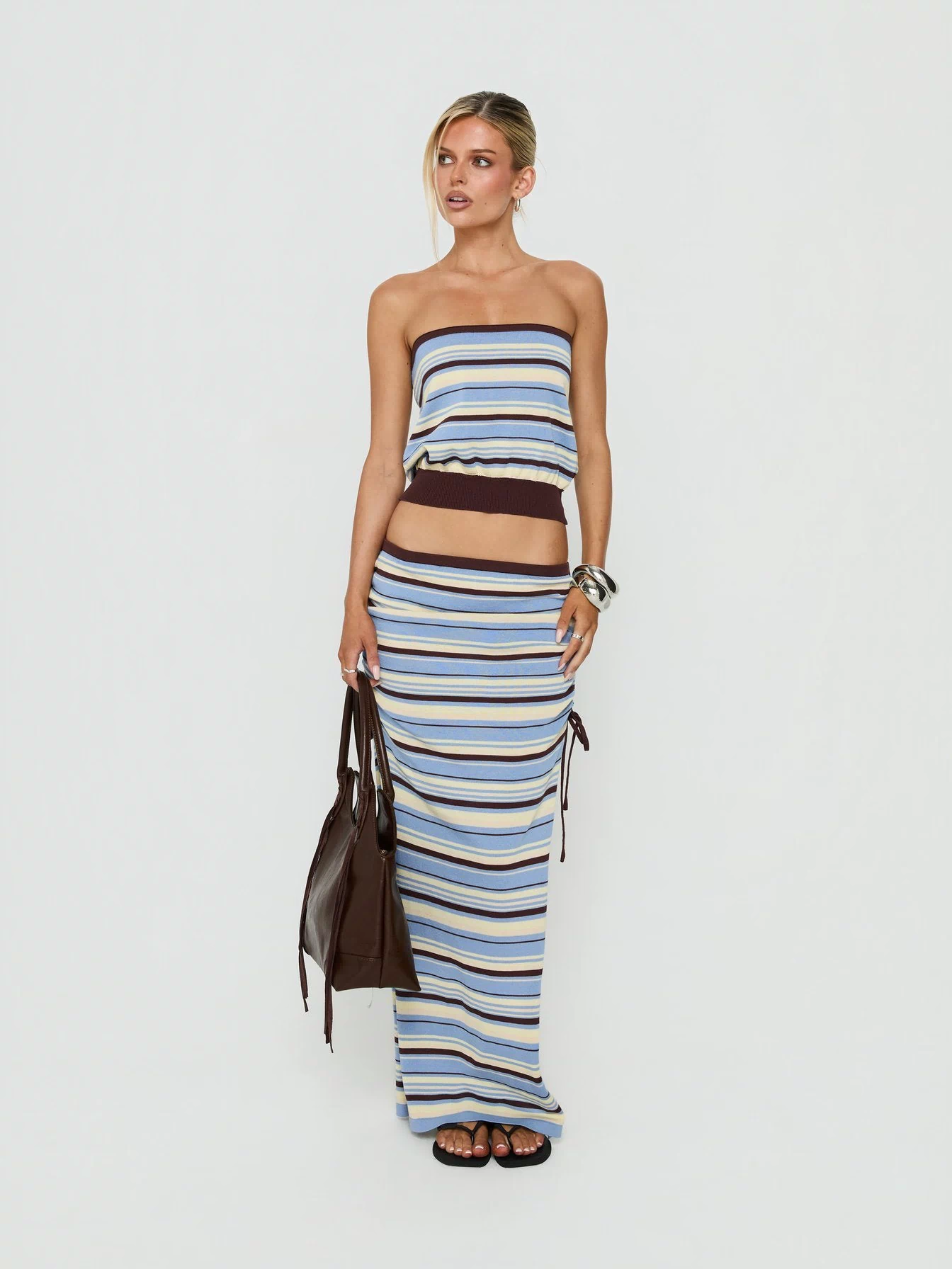 Featuring the Osamie Knit Drawstring Maxi Skirt Multi Stripe in womens-skirts with ruched details and fitted silhouette front view of model wearing Princess Polly