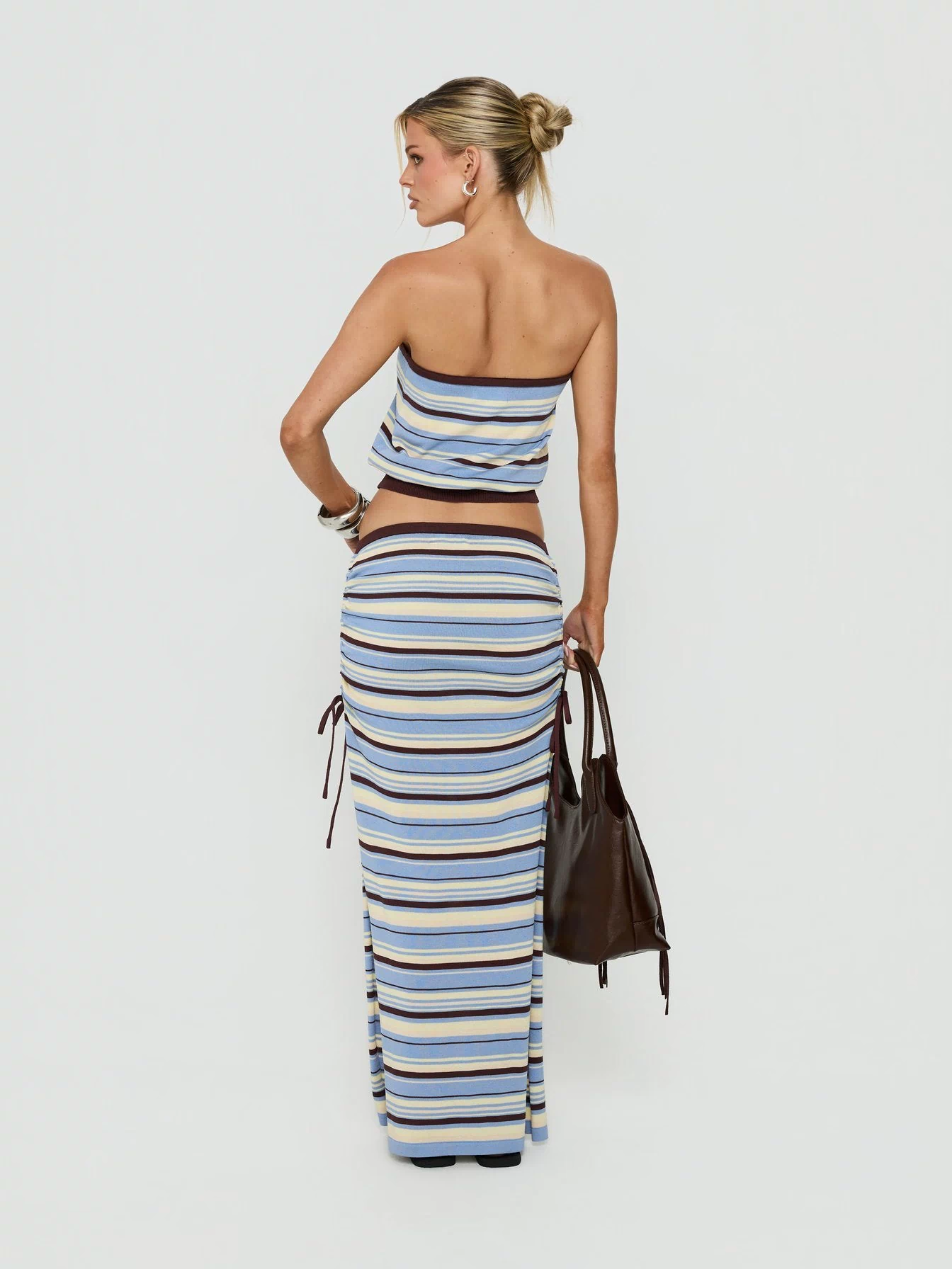 Presenting the Osamie Knit Drawstring Maxi Skirt Multi Stripe in womens-skirts with ruched details and fitted silhouette back view of model wearing Princess Polly