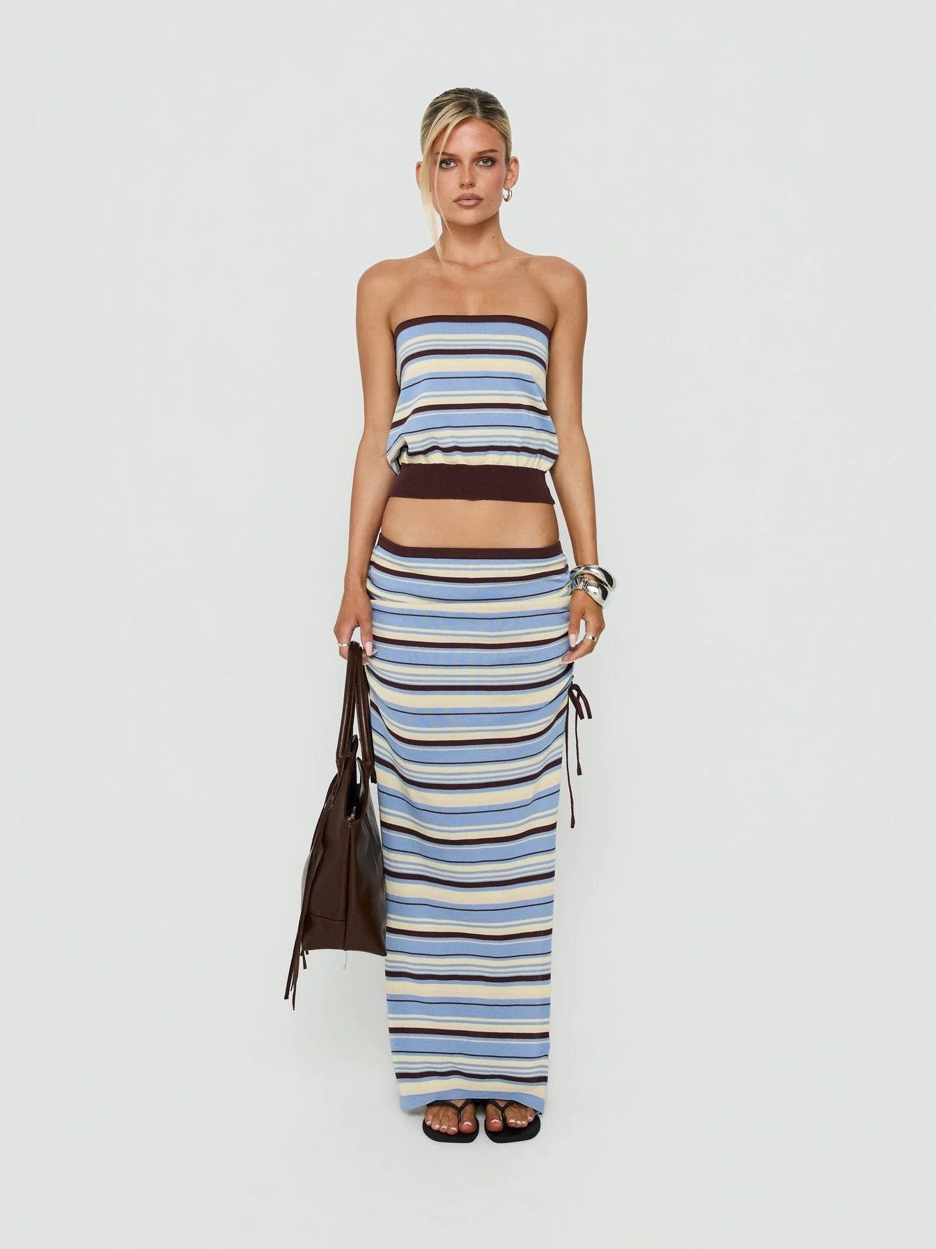 Featuring the Osamie Knit Drawstring Maxi Skirt Multi Stripe in womens-skirts with ruched details and fitted silhouette front view of model wearing Princess Polly