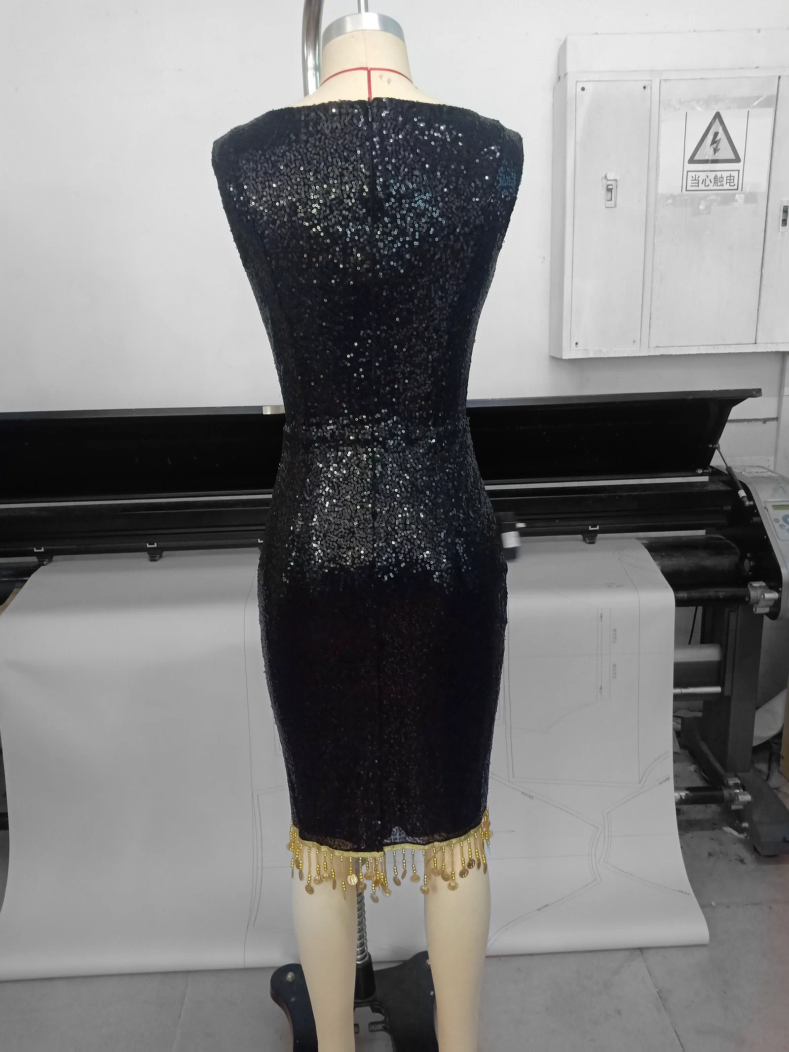 Pauline Sacred Heart Sequin Wiggle Dress — black sequin wiggle dress with gold beaded hem, Sacred Heart sequin appliqué, and diamond straps by Weasel Wear.