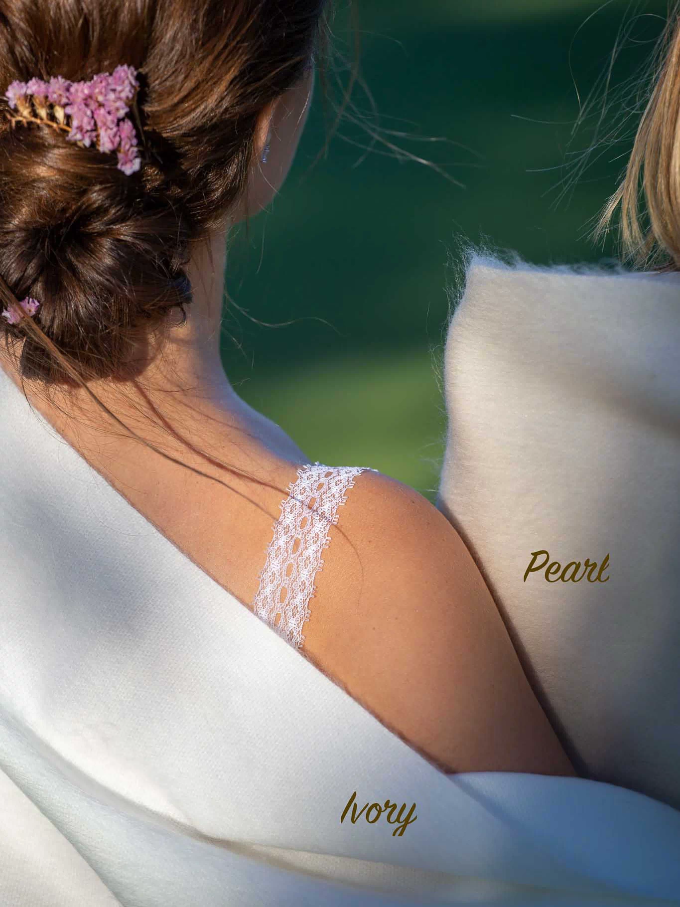 Close-up of pearl alpaca shawl fabric with subtle champagne sheen