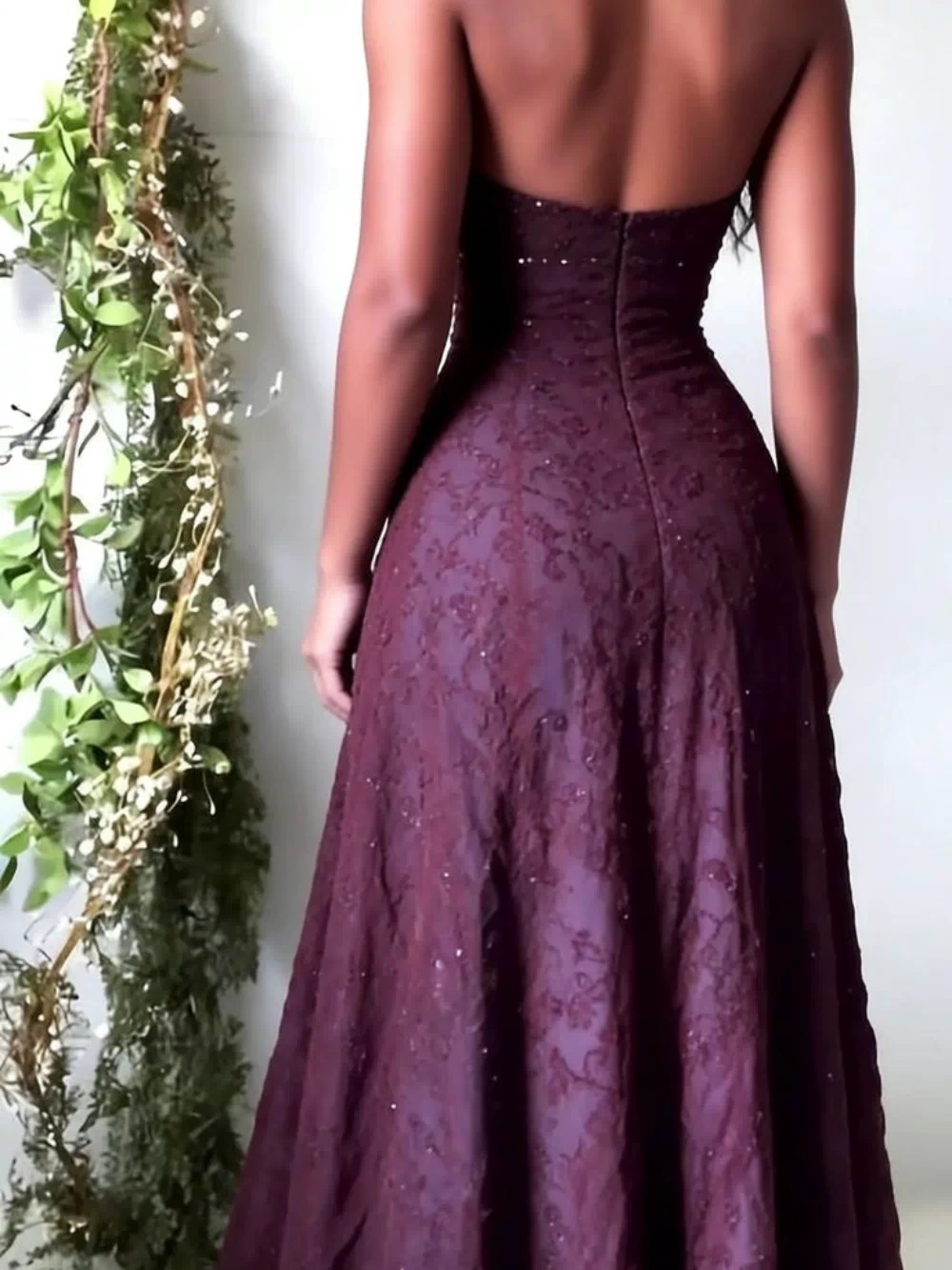 Woman wearing purple lace halter evening gown - elegant formal dress detail