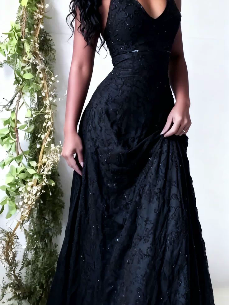 Black halter prom dress detail shot - V-neckline and lace pattern