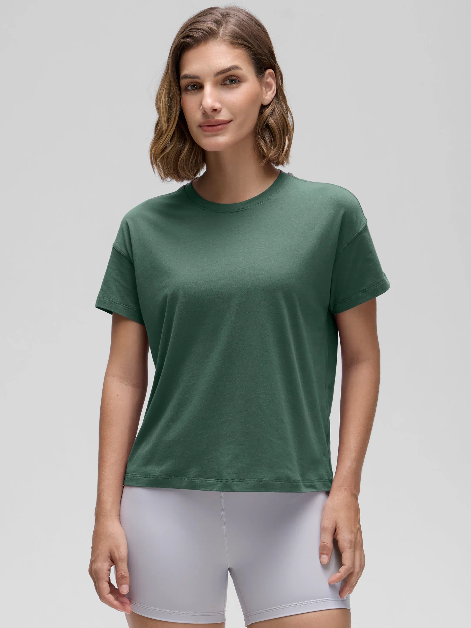 CRZ YOGA Women's Yoga Loose Fit Shirt Pima Cotton Short Sleeves Graphite Green @model_info:Jaynne