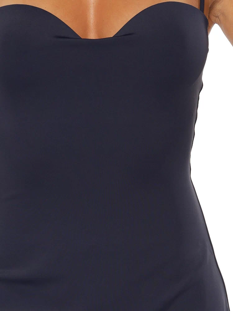 Close-up of the navy mini dress showing the sweetheart neckline and thin spaghetti strap