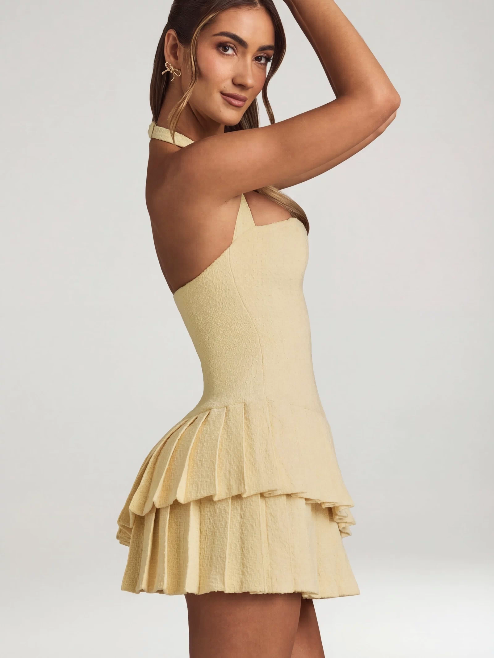 Oh Polly's Freya Tidy wearing the Rosaria Mini Dress in Pastel Yellow Tweed fabric perfect for spring garden parties