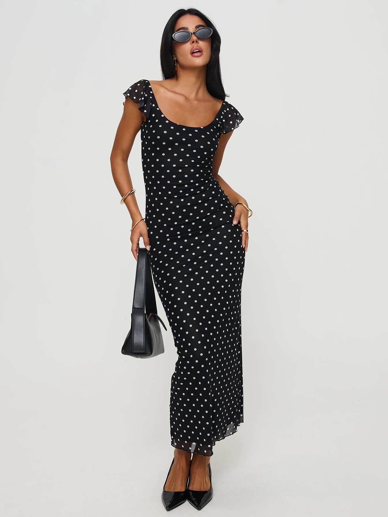 front view of model wearing Princess Polly Sandberg Maxi Dress Black Polka Dot Scoop Neck 