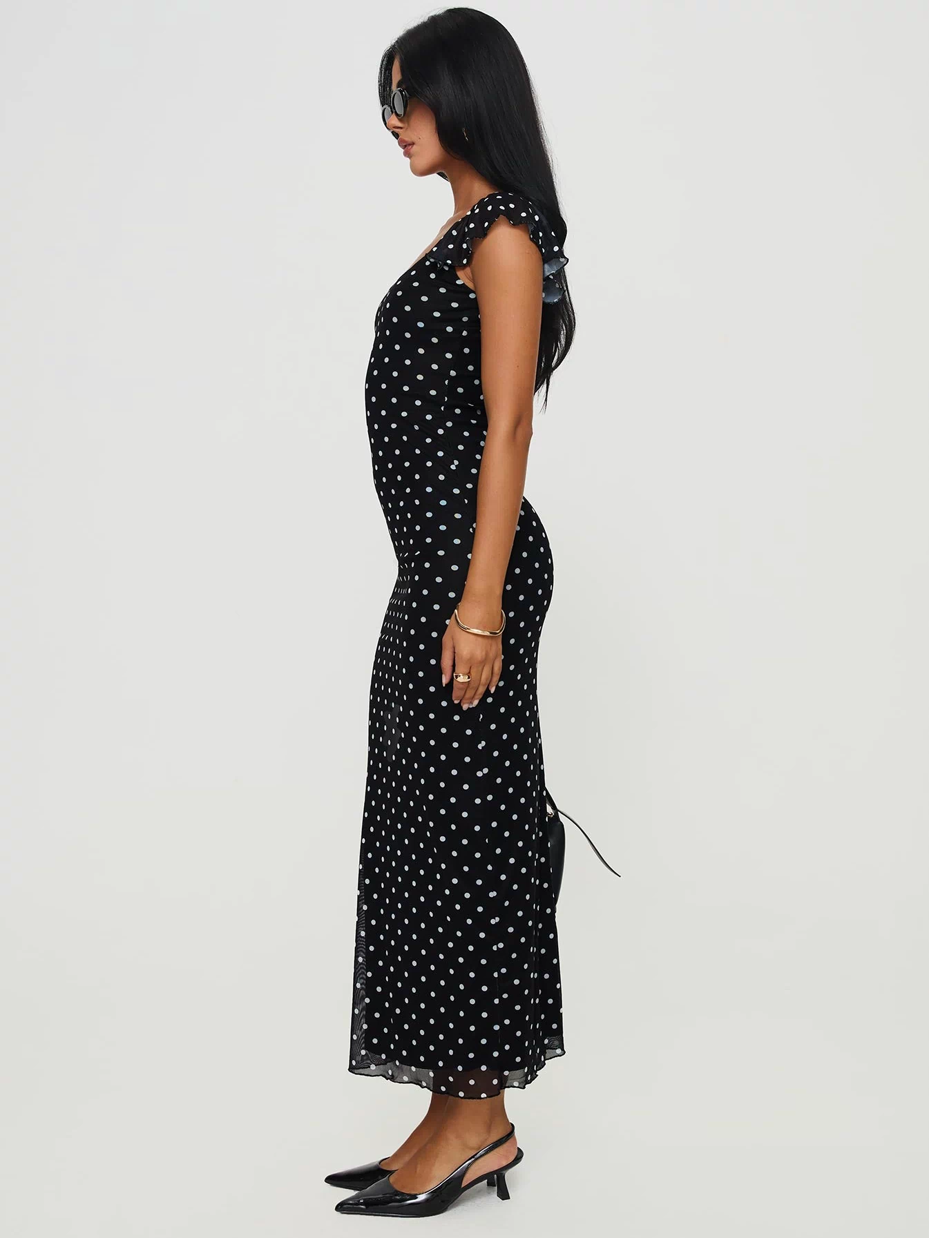 side view of model wearing Princess Polly Sandberg Maxi Dress Black Polka Dot Scoop Neck 