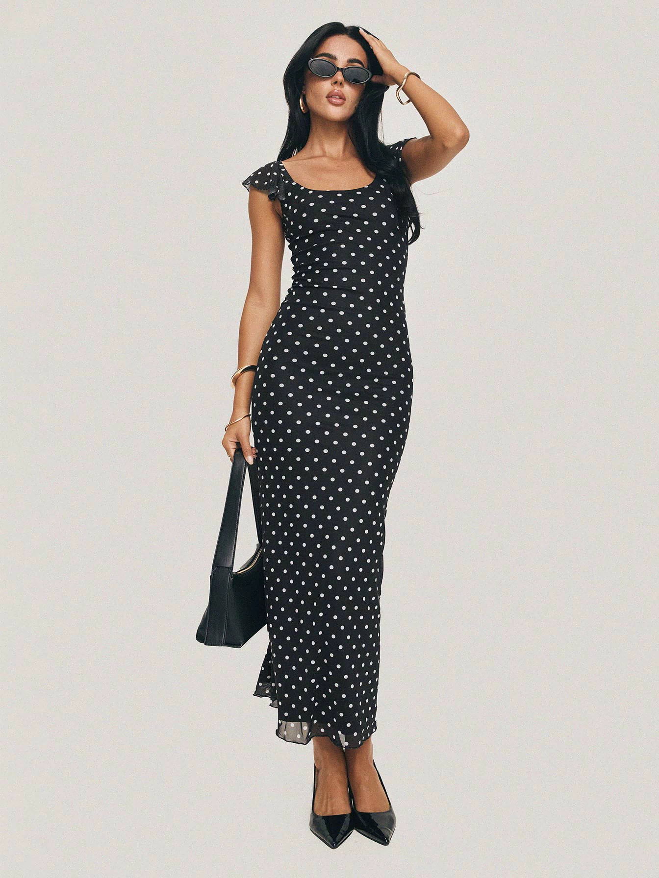 front view of model wearing Princess Polly Sandberg Maxi Dress Black Polka Dot Scoop Neck 
