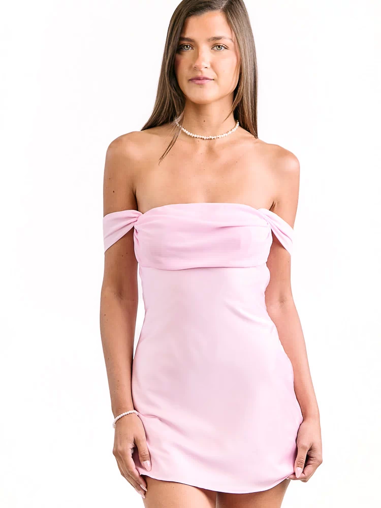 Front view of a pink off-the-shoulder mini dress with a draped bodice and short gathered sleeves