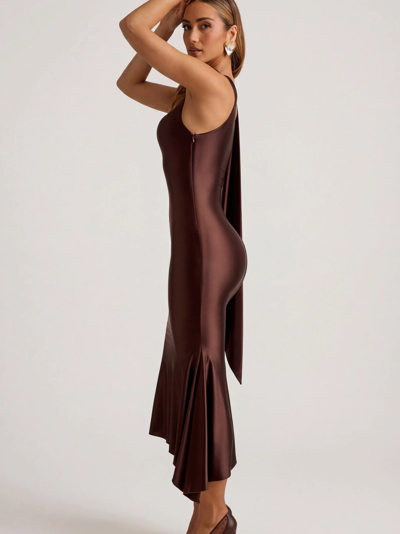 Oh Polly's Priscilla wearing the Shaya Midaxi Dress in Chocolate Brown Satin Jersey fabric perfect for wedding guest style