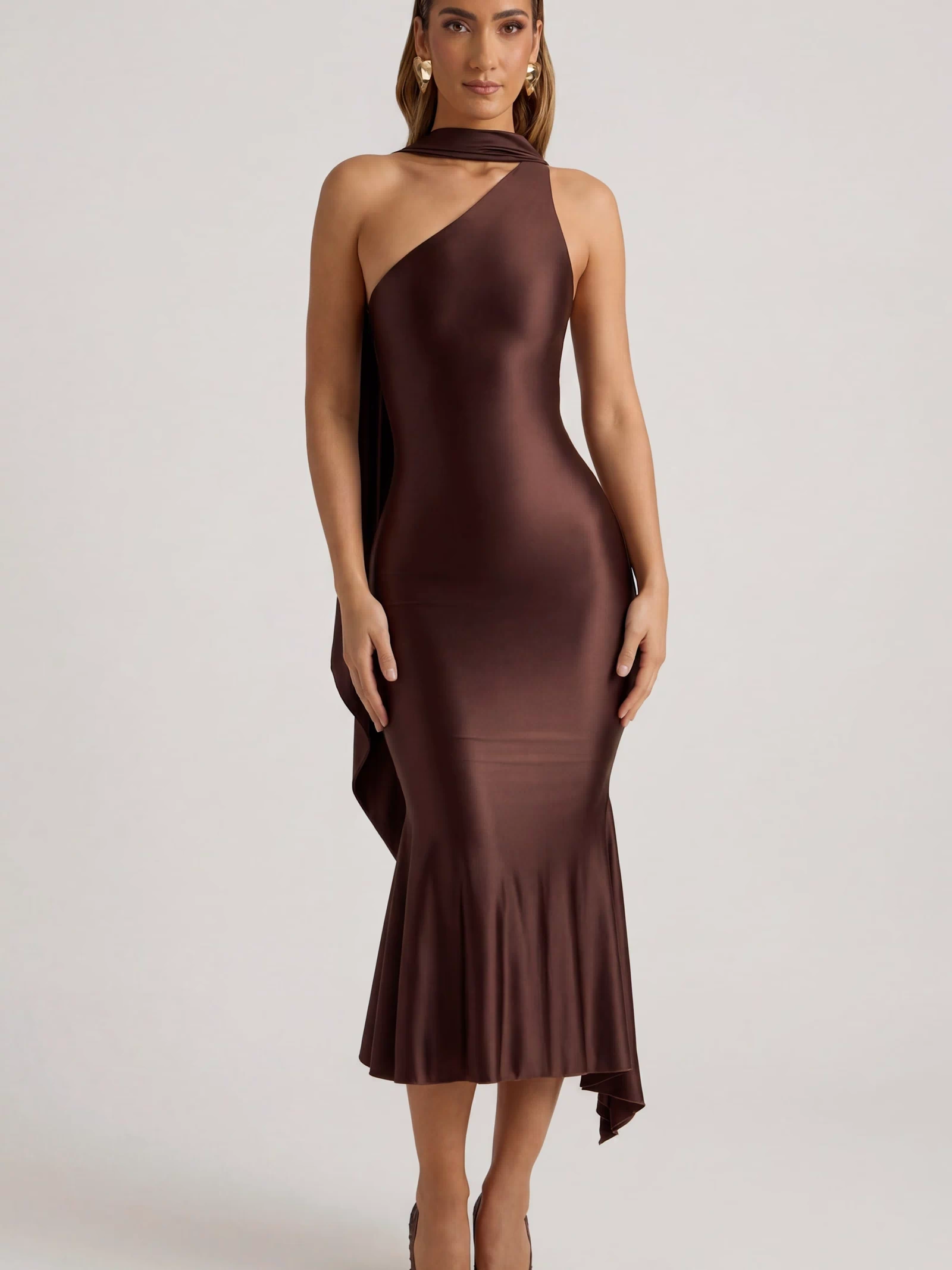 Oh Polly's Priscilla wearing the Shaya Midaxi Dress in Chocolate Brown Satin Jersey fabric perfect for holiday celebrations