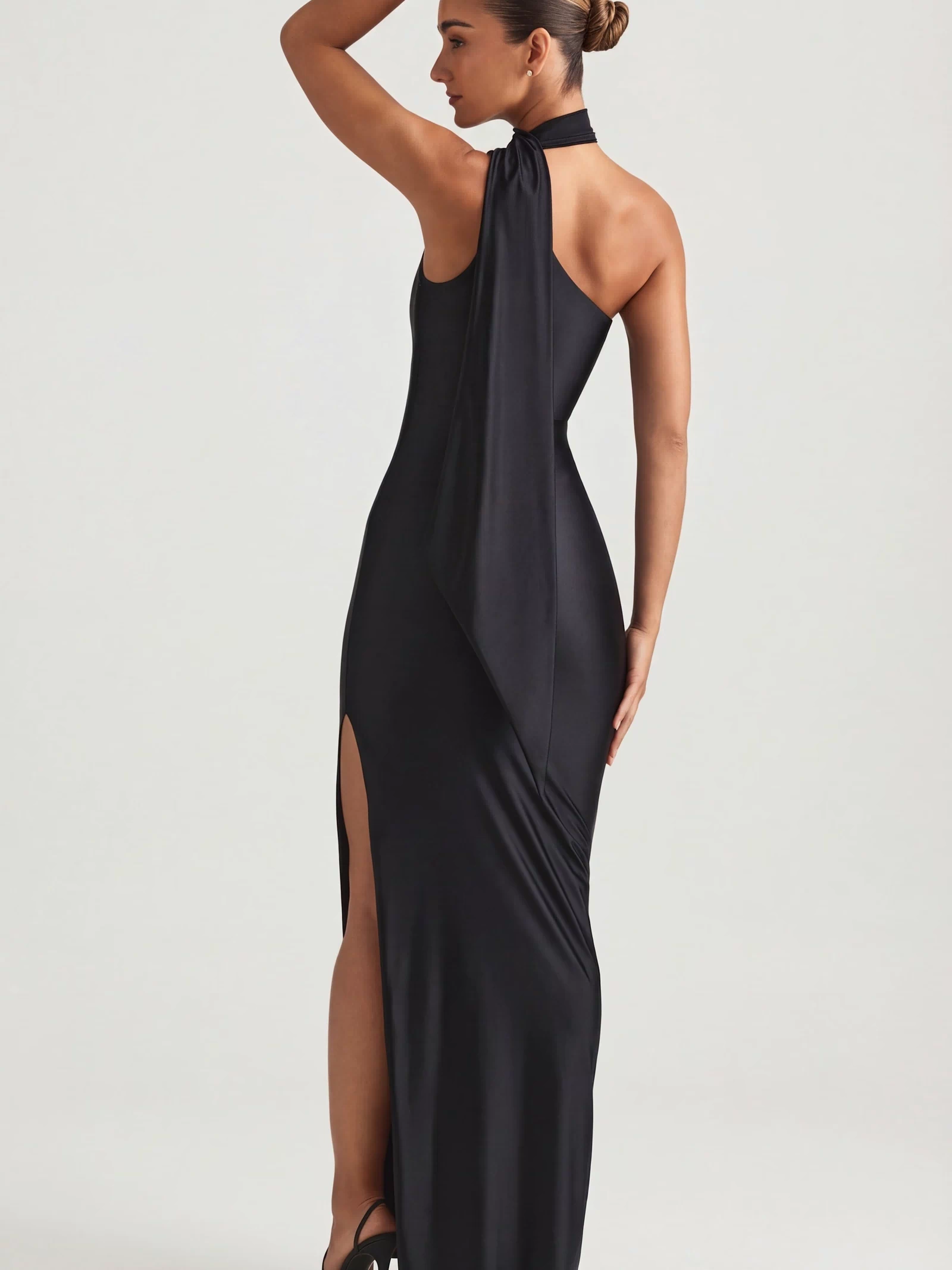 Oh Polly's Priscilla wearing the Sheril Gown Length Dress in Black Satin Jersey fabric perfect for elegant evening events