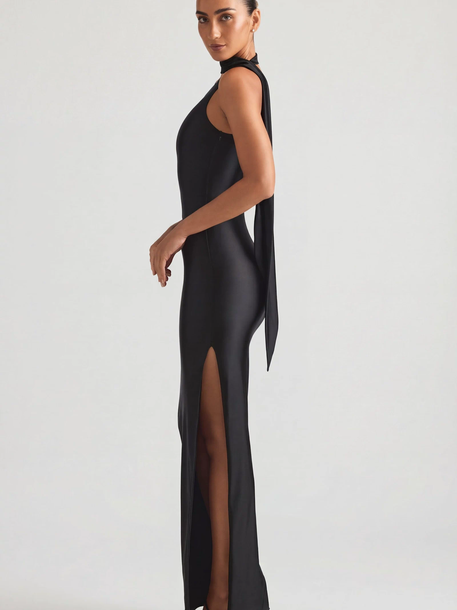 Oh Polly's Priscilla wearing the Sheril Gown Length Dress in Black Satin Jersey fabric perfect for black tie galas