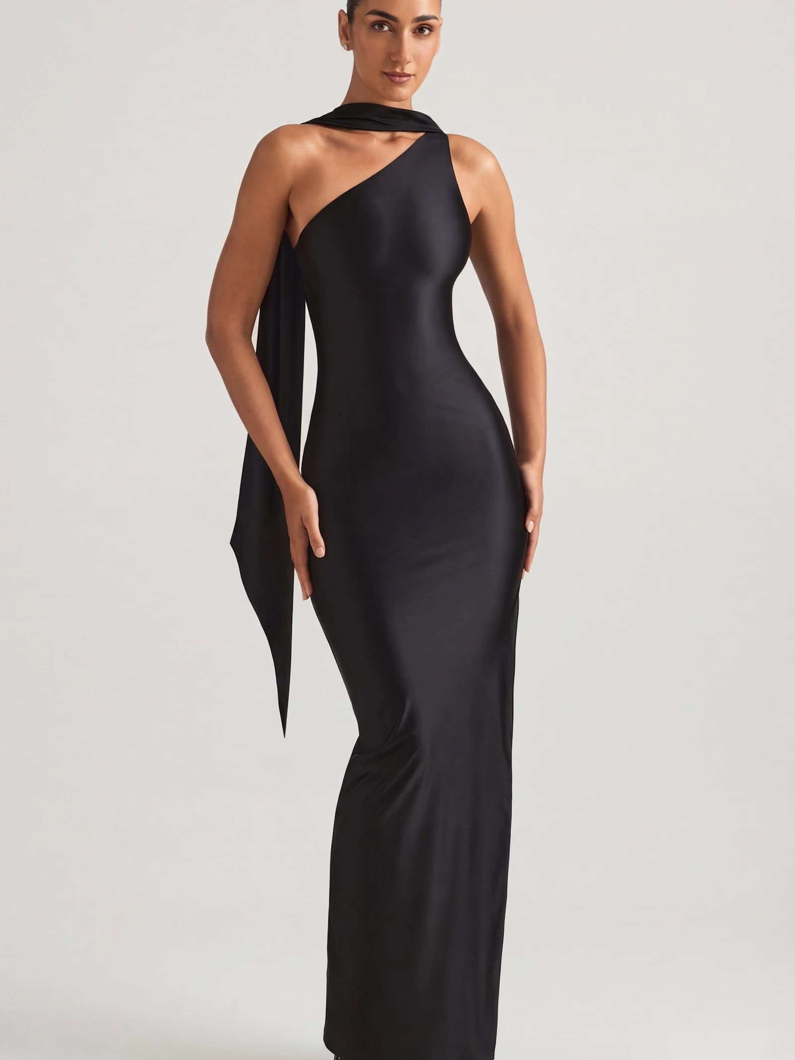 Oh Polly's Priscilla wearing the Sheril Gown Length Dress in Black Satin Jersey fabric perfect for cocktail receptions