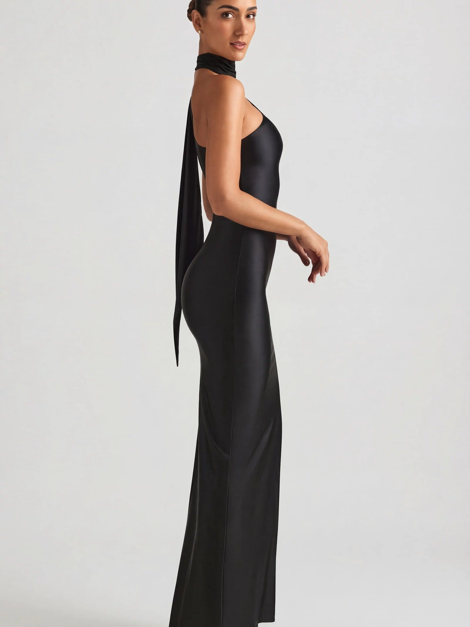 Oh Polly's Priscilla wearing the Sheril Gown Length Dress in Black Satin Jersey fabric perfect for upscale date nights