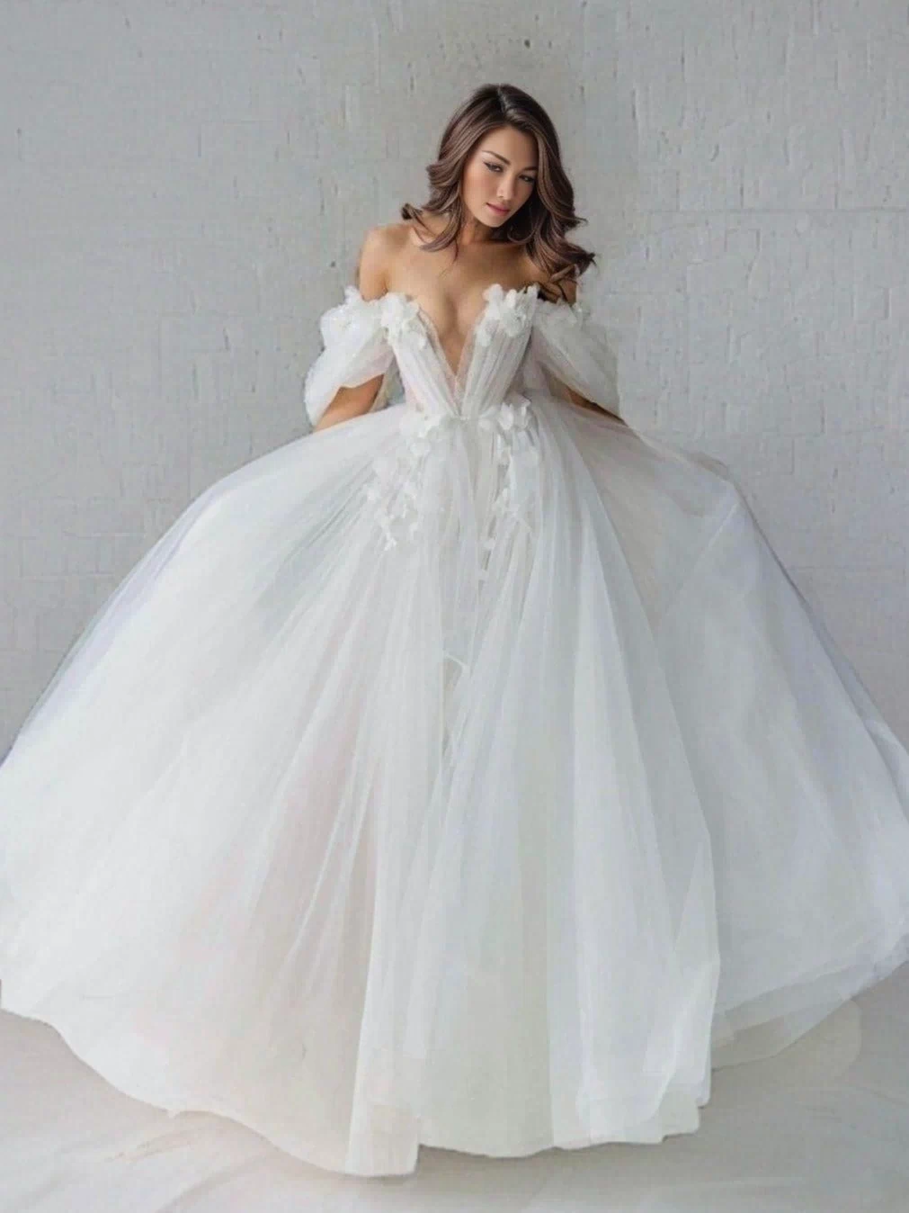 Bride twirling in the SHERYL gown, highlighting its layered tulle skirt.