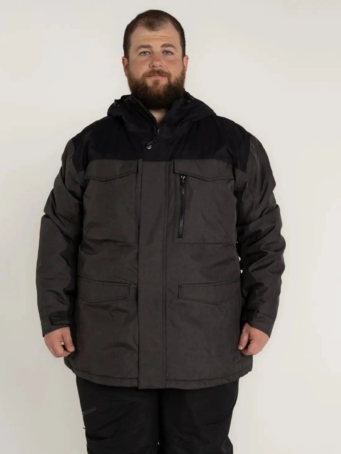 Man wearing a gray and black insulated winter parka from Snow Country Outerwear Men’s Big Sizes