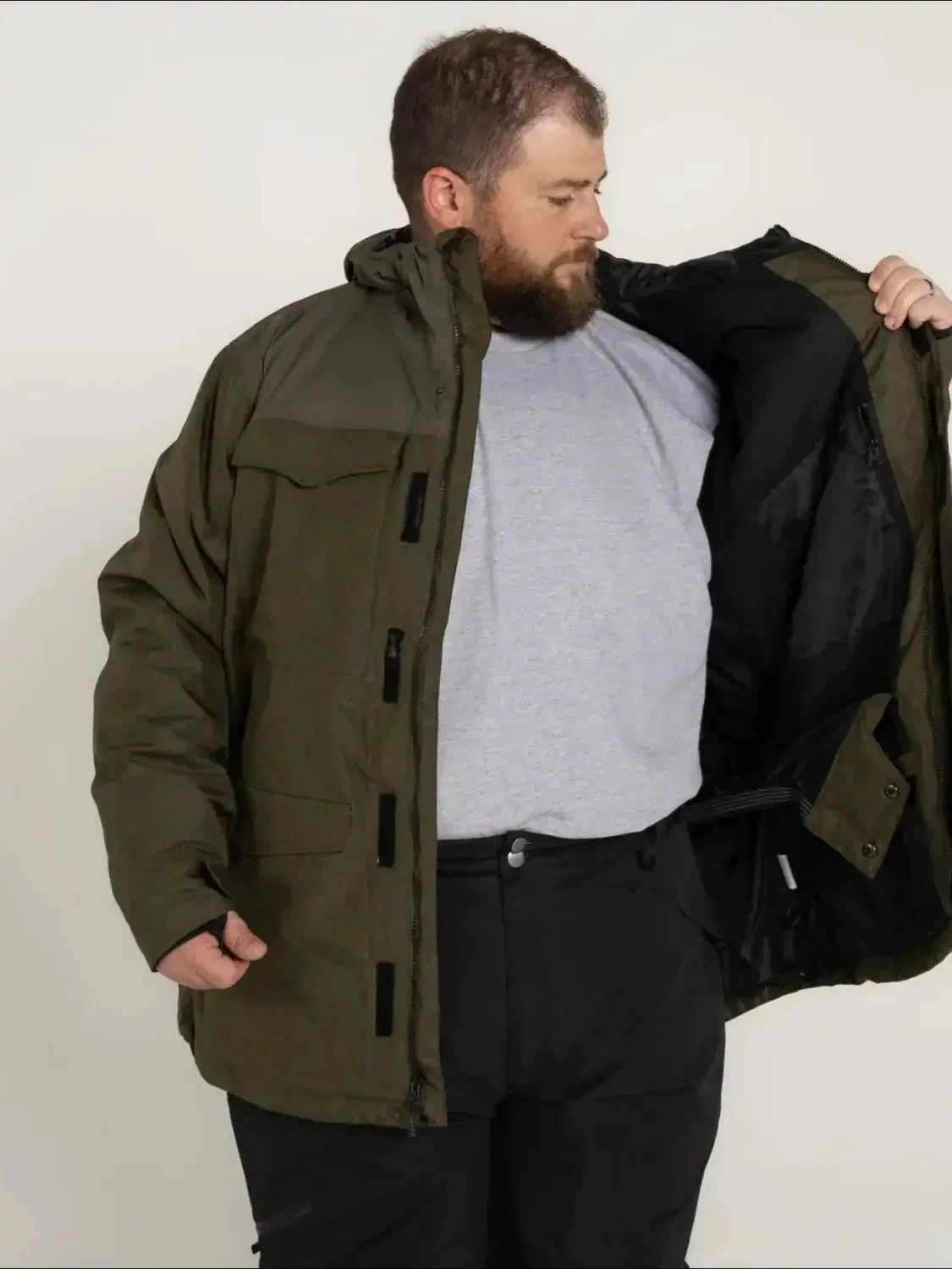 Olive green winter jacket for men from Snow Country Outerwear ideal for skiing and snowboarding