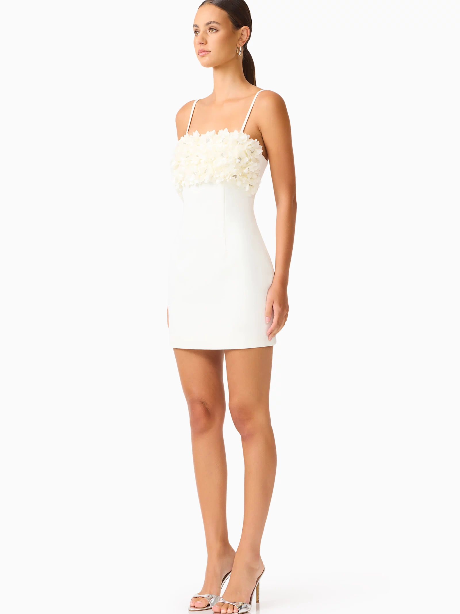 Solenne Party Mini Dress in White with a 3D floral detail side shot