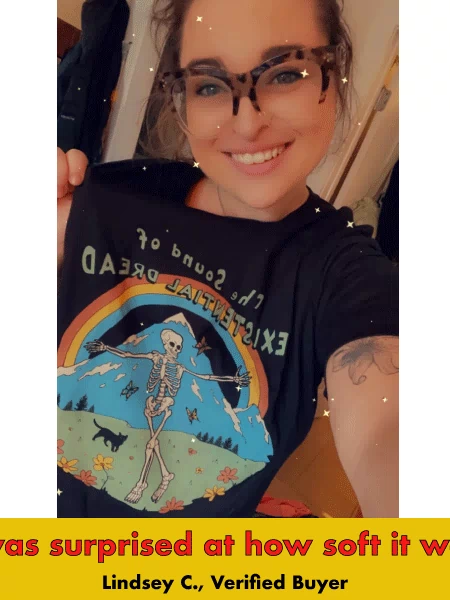 Black graphic tee with skeleton, rainbow, and forest design featuring 'Sound of Existential Dread' text