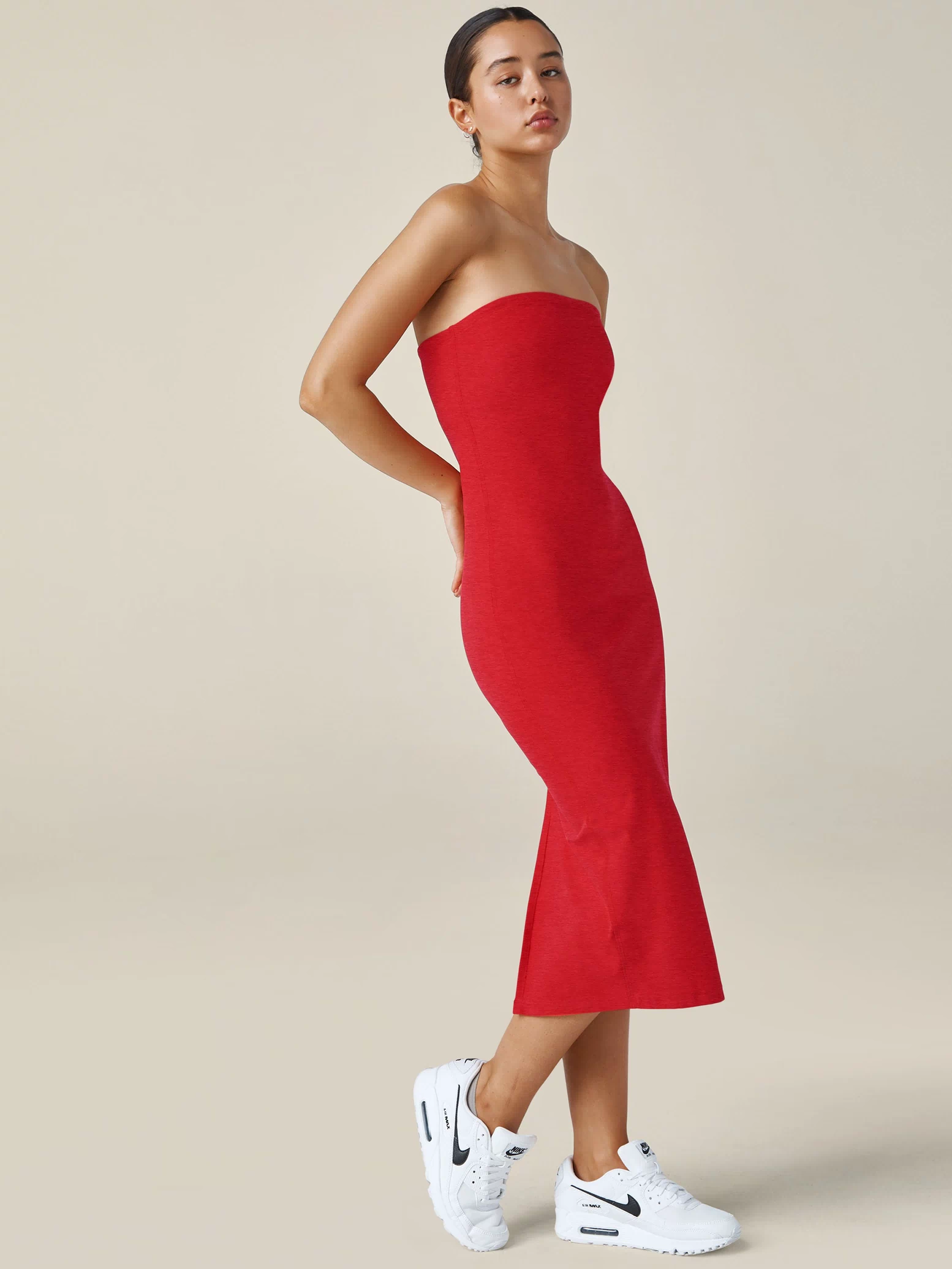 red strapless midi length dress. 