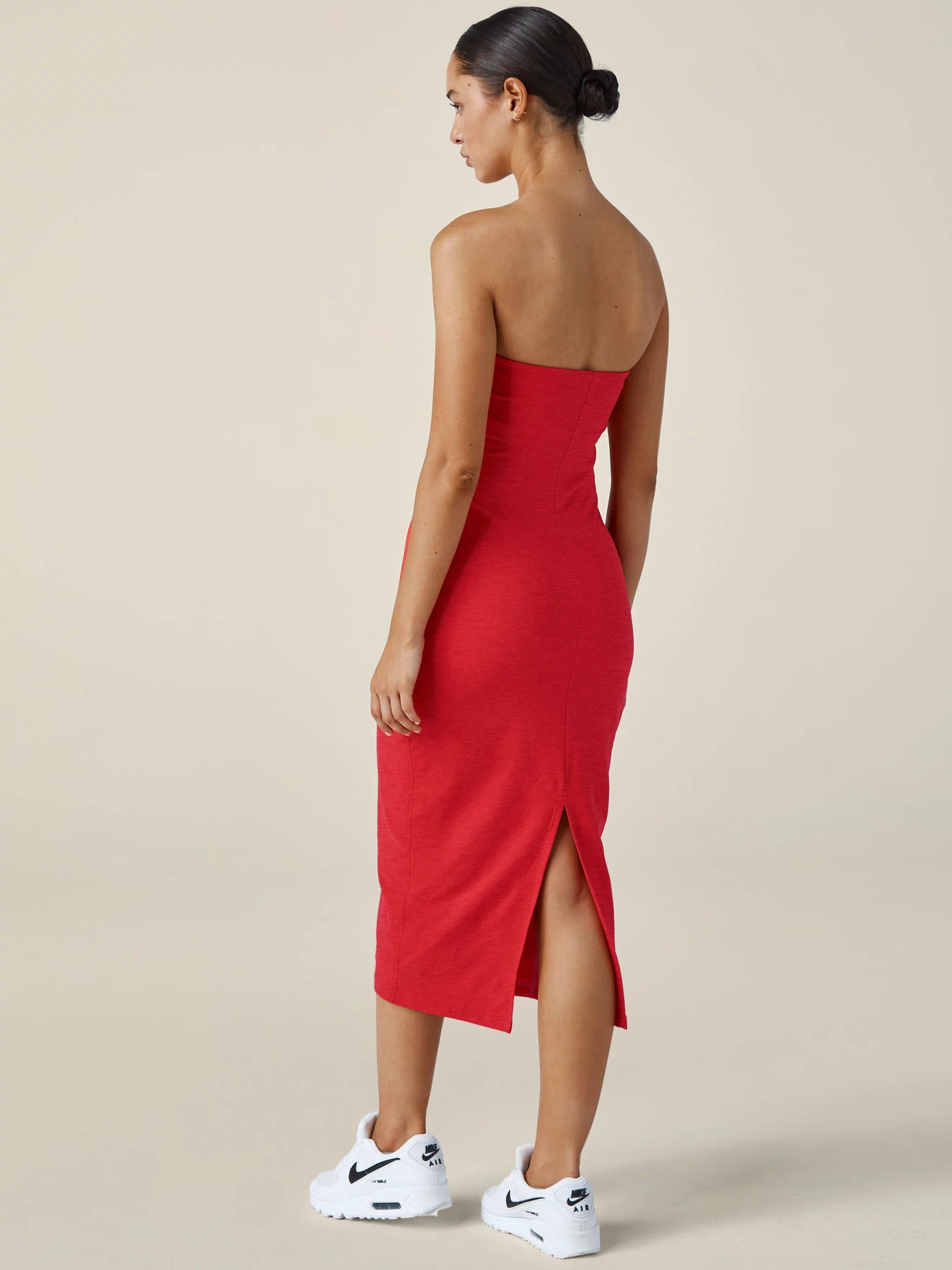 red strapless midi length dress. 