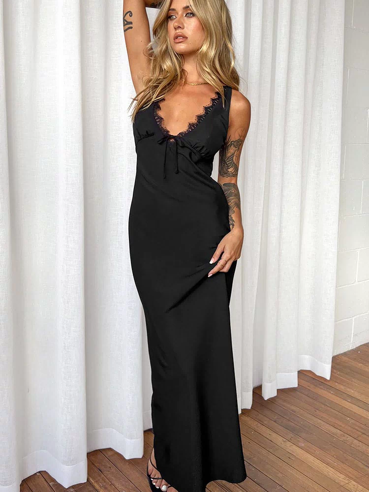 Full-length view of a black satin maxi dress featuring a lace V-neckline and tie-front bust