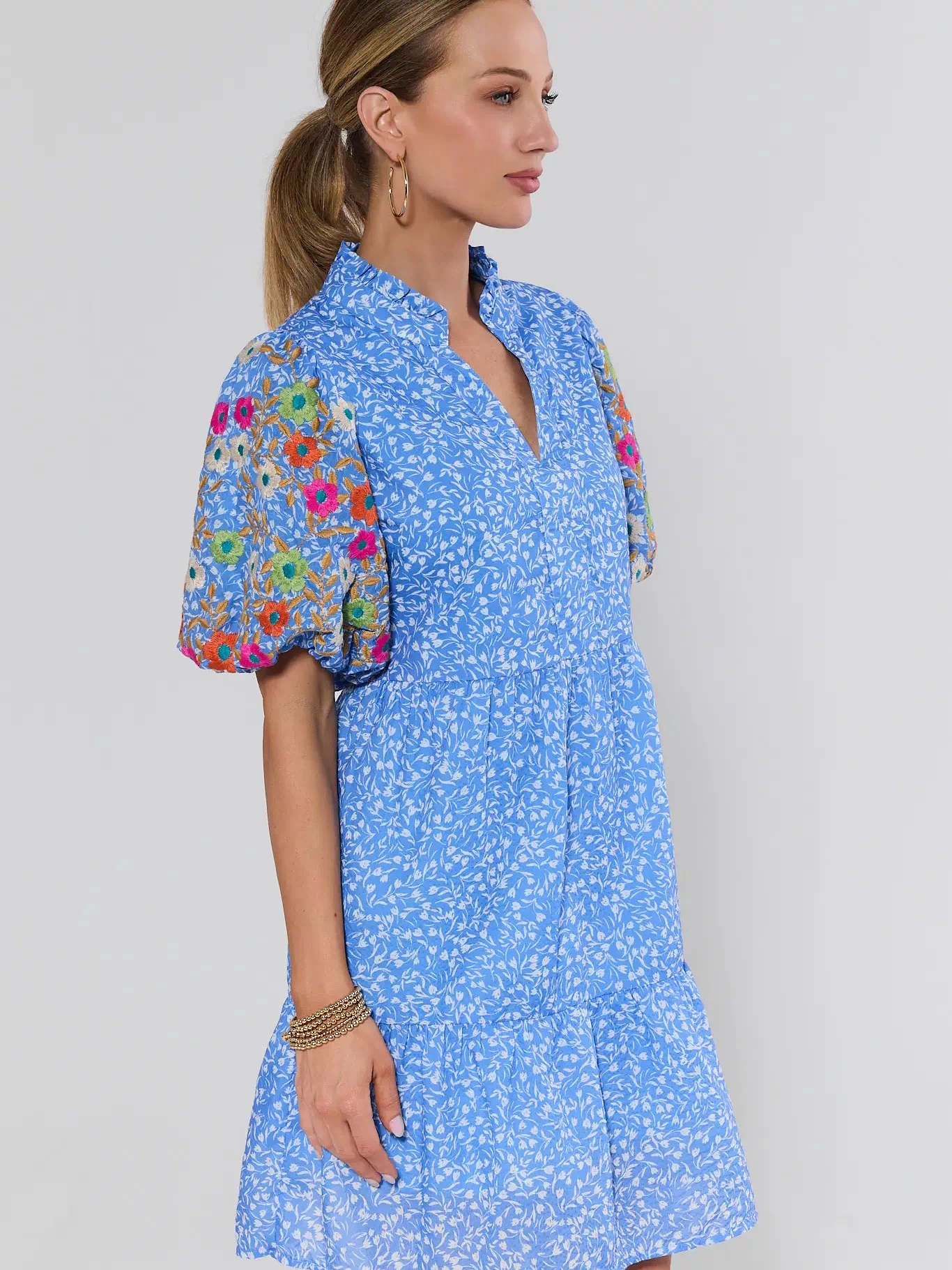 Sue Ann Blue Floral Short Dress by THML - side profile showing floral embroidered puff sleeves and tiered flounce hem | Avara