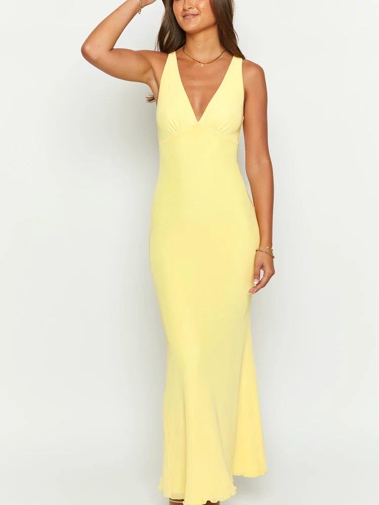 Front view of a sunflower yellow mesh maxi dress with a deep V-neckline and ruched bust, fitted silhouette