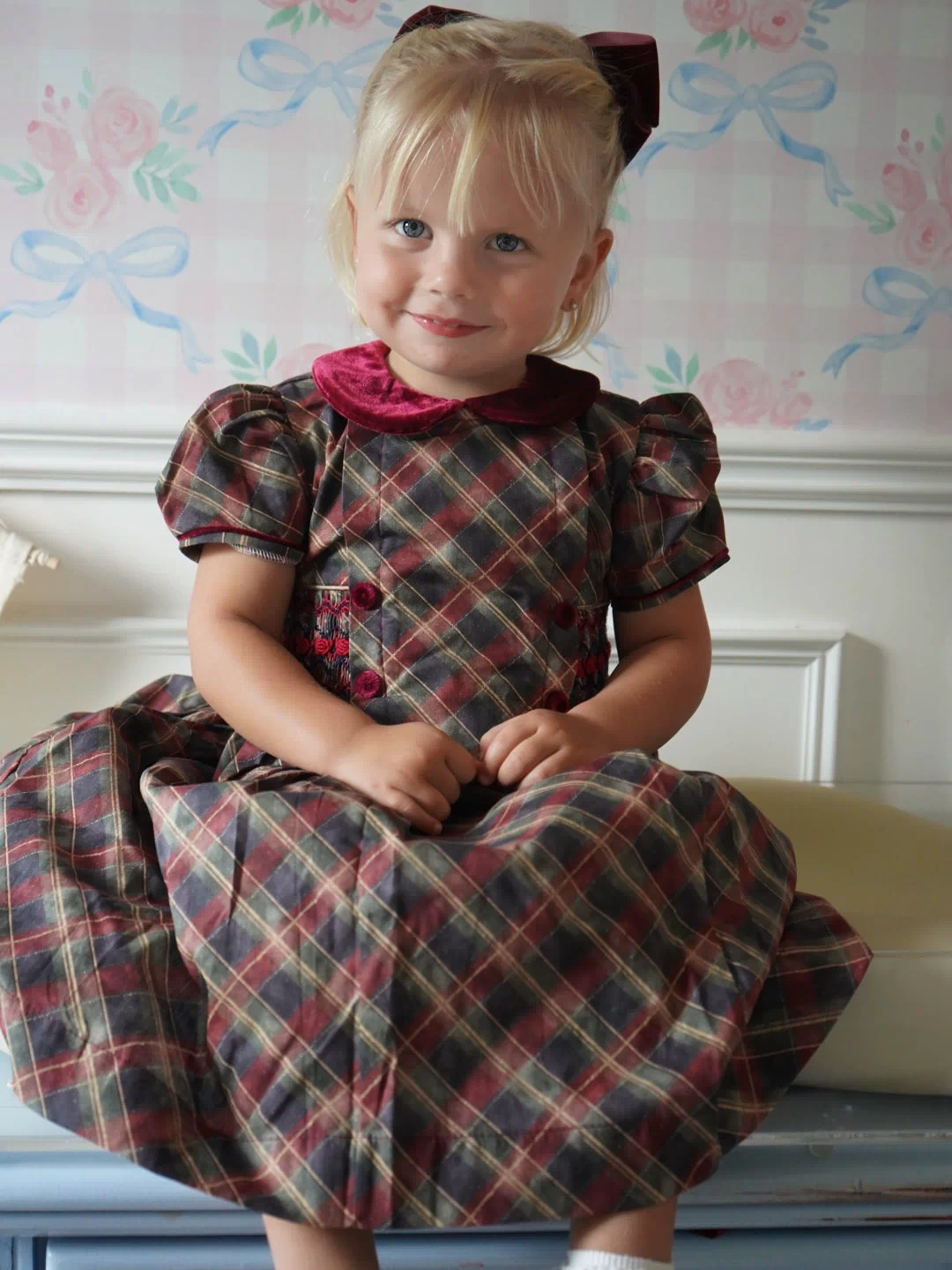 Girl wearing Tartan Luxe Handsmocked Christmas Dress 2