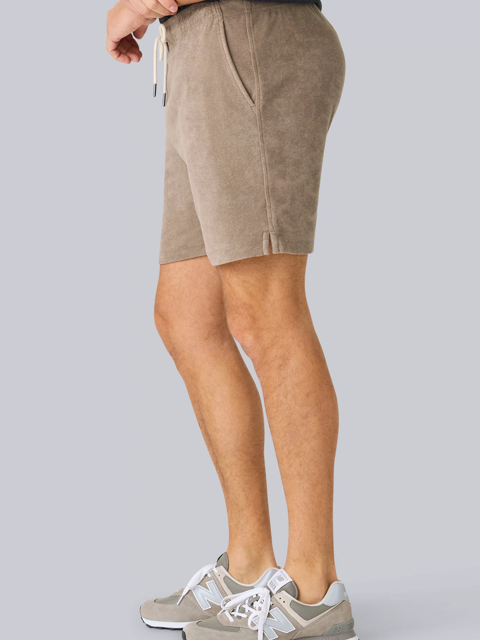Side view of a man wearing Terry Cloth Short in Desert Taupe
