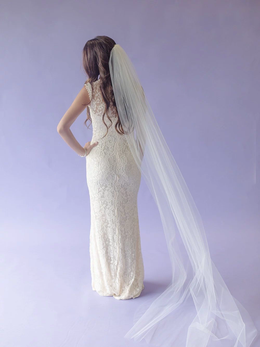 The Blanca bridal veil shown on bride, handmade by Blanca Veils