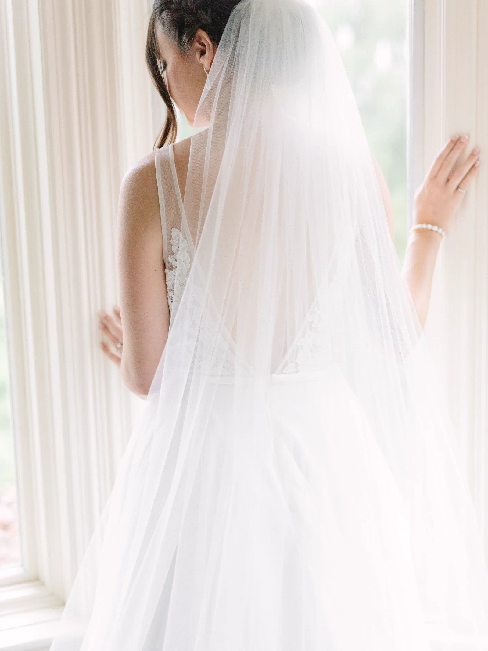 The Blanca handmade wedding veil styled with bridal hair