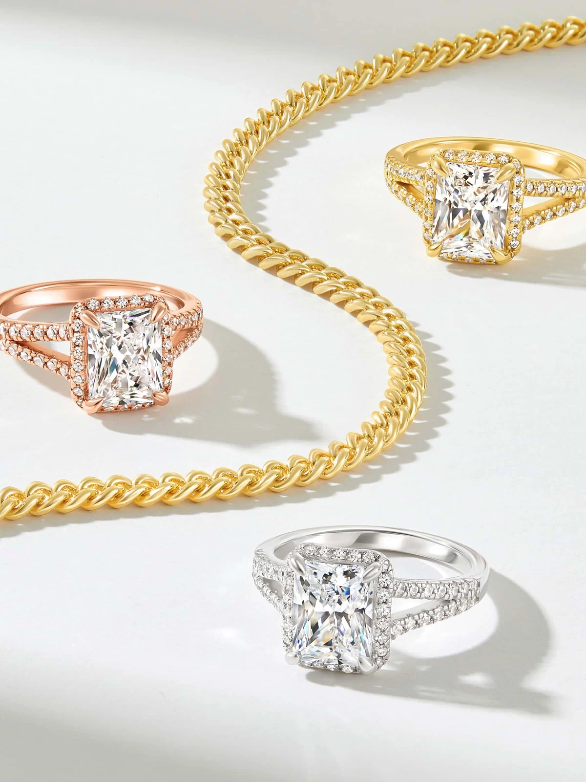 3.5 ct rose gold, gold, and silver evelyn radiant cut engagement ring with gold necklace