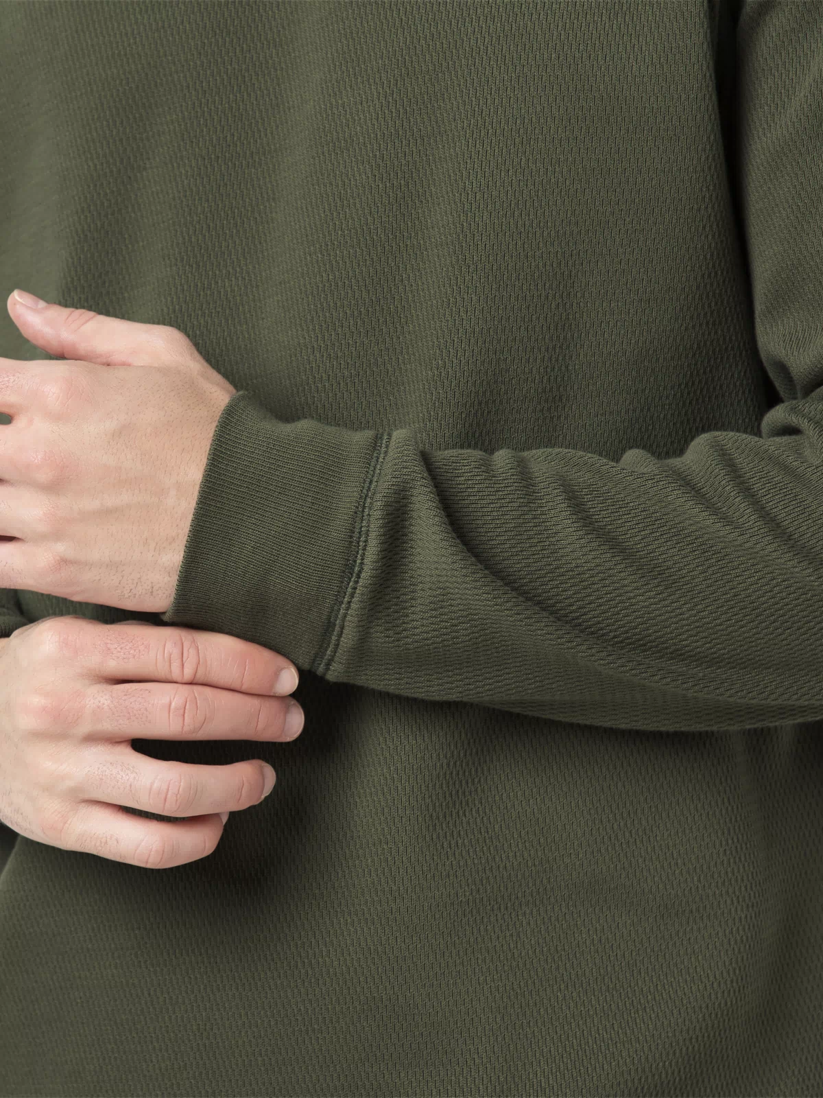 Thermal Knit Crew Fern close up sleeve on model