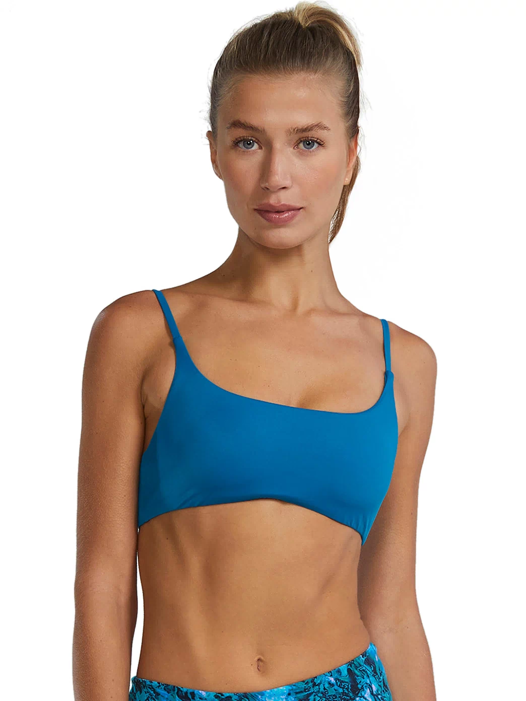 TYR active recreation bikini top in a vibrant peacock blue shade, designed for comfort and style. Ideal for swimming and beach activities, this top features adjustable straps for a customizable fit. Perfect for those seeking a stylish and functional swimwear option.