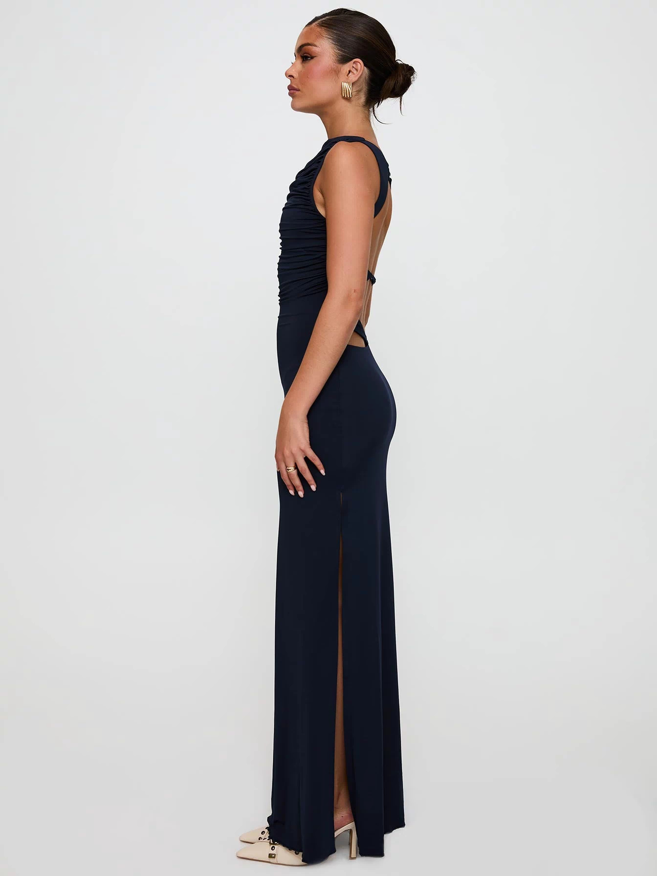 side view of model wearing Princess Polly Undeniable Cut Out Maxi Dress Navy High Neck 