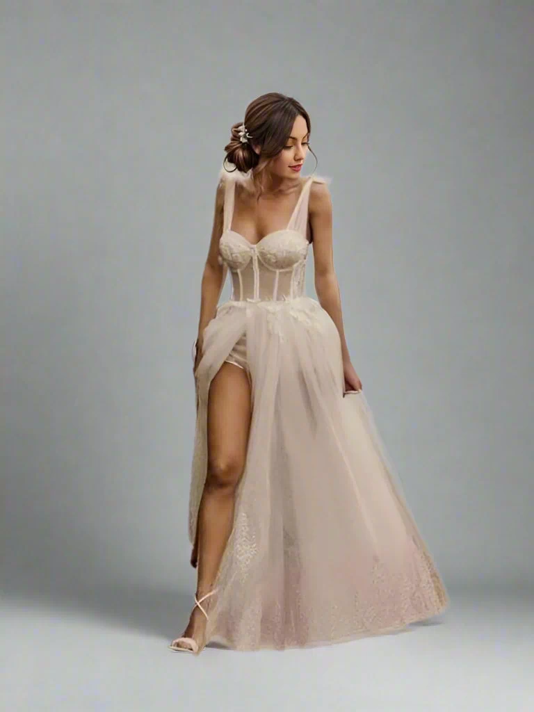 Full-length image of a bride in a glitter lace wedding gown showing leg in high slit.
