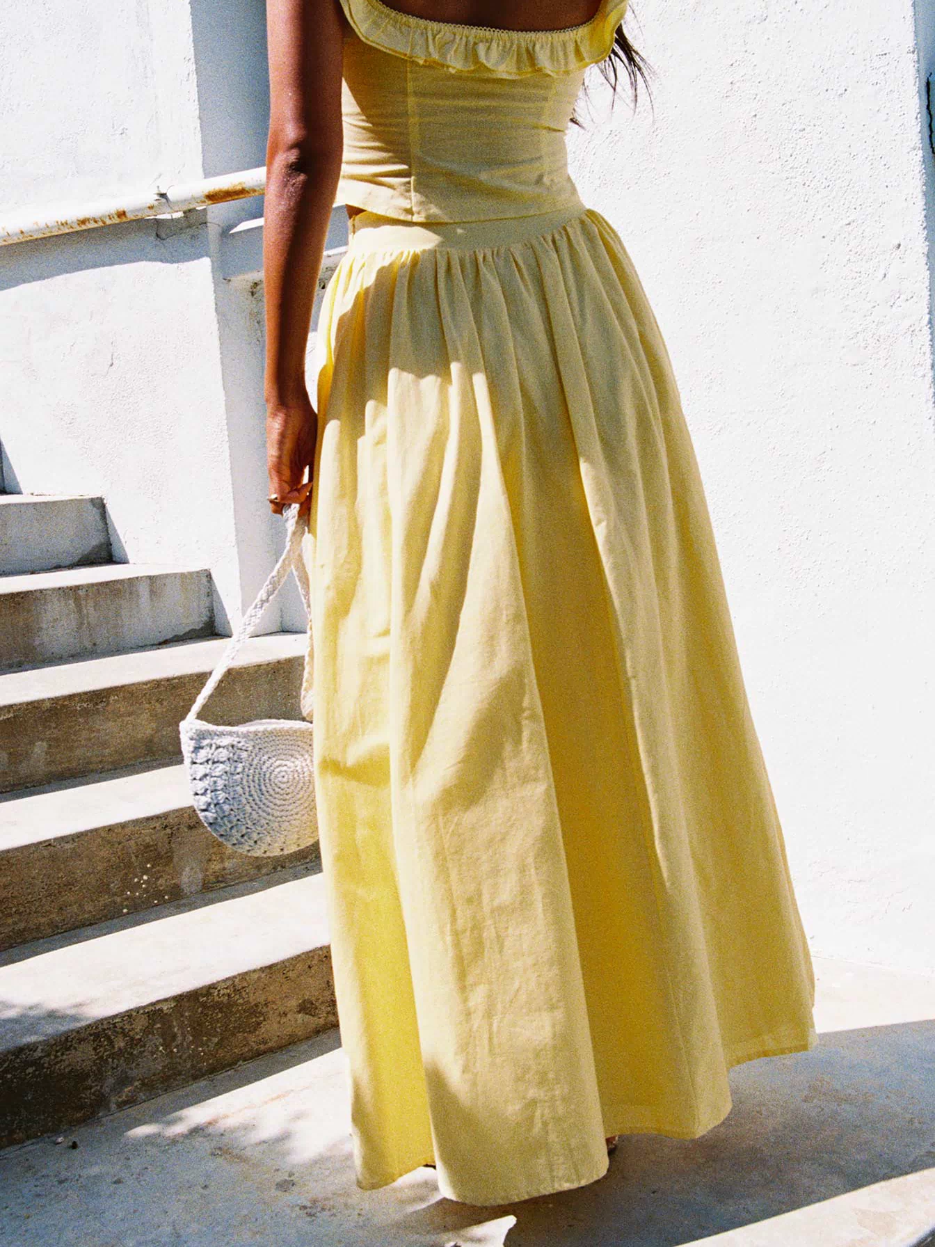 back view of model wearing Princess Polly Valerio Maxi Skirt Yellow Maxi Skirts Skirts 