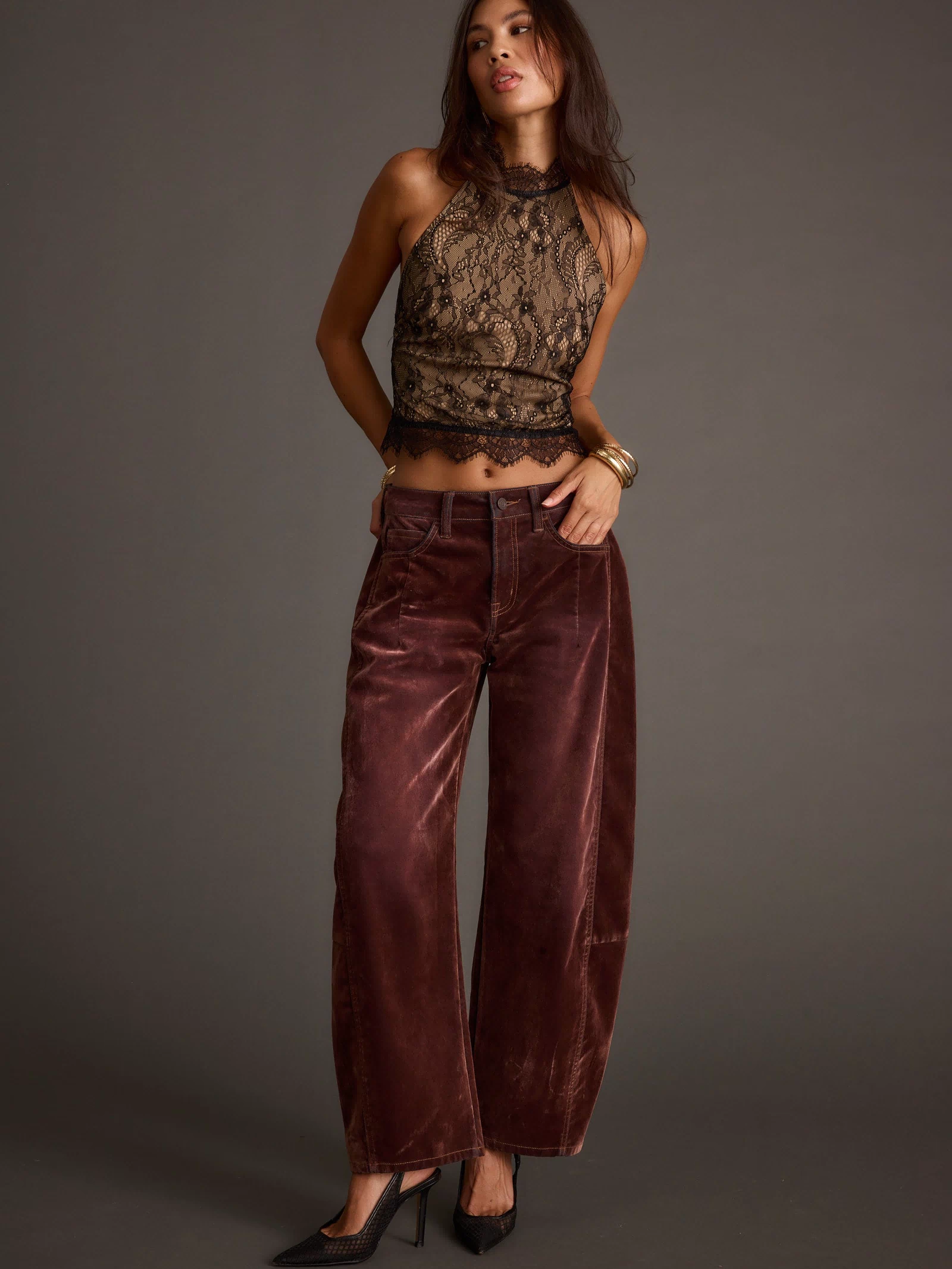 Back view of the black lace halter top showing the silhouette and fit.