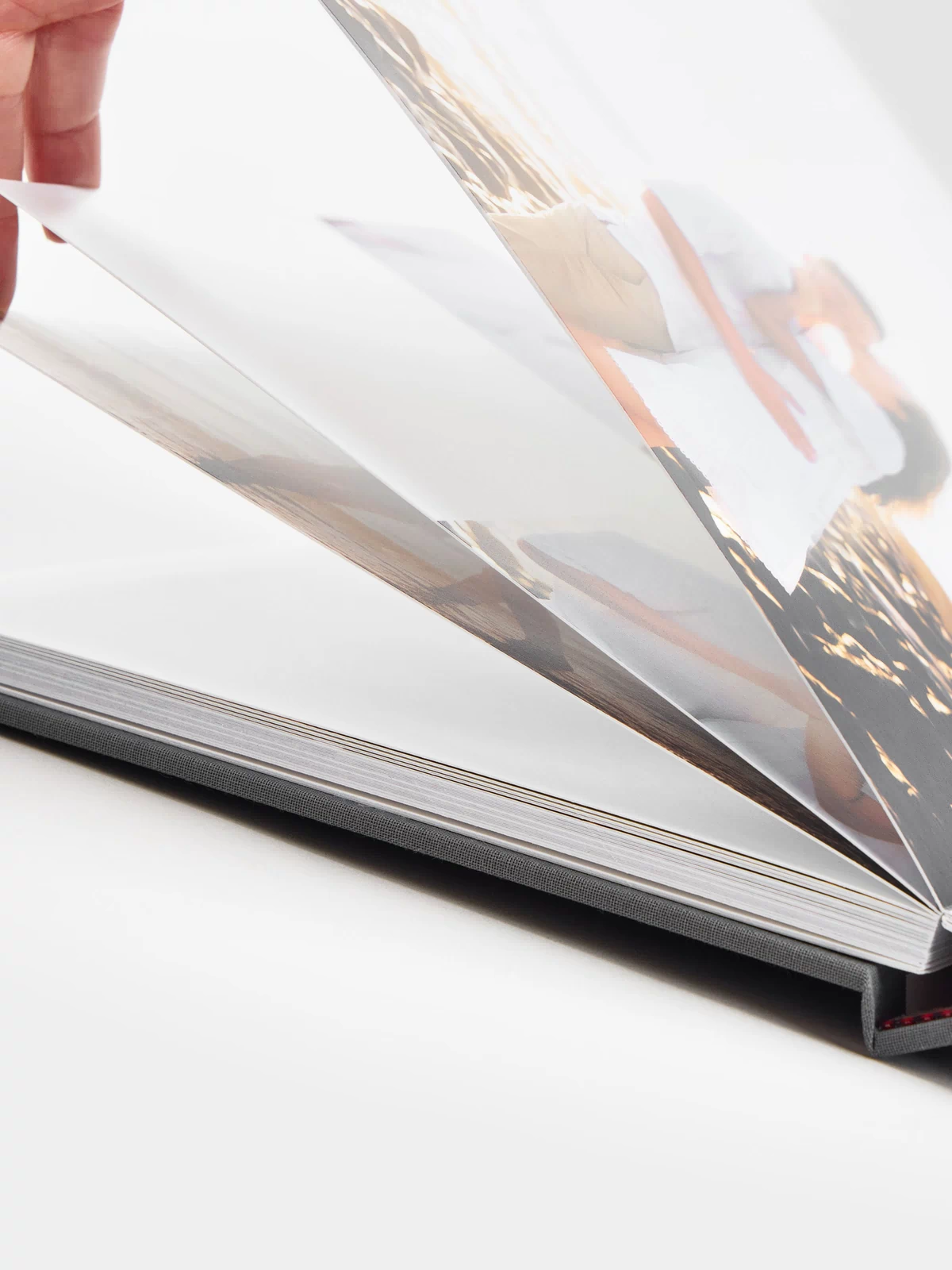 Detail shot of page thickness and binding on layflat wedding photo album 